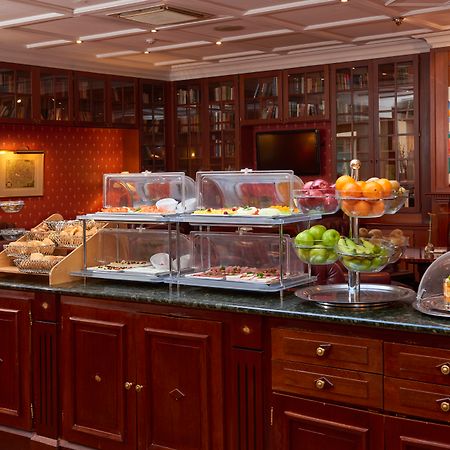 Eurostars Montgomery Brussel Bagian luar foto A buffet at a hotel